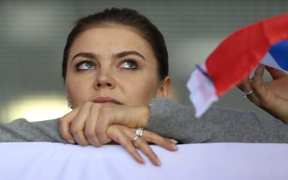 Alina Kabaeva, Russian Olympic champion in rhythmic gymnastics, watches the men's Preliminary Round Group A ice hockey match Russia vs Slovakia at Bolshoi Ice Palace at the 22nd Winter Olympic Games on February 16, 2014 in Sochi, Russia. / Credit: Visual China Group/Getty