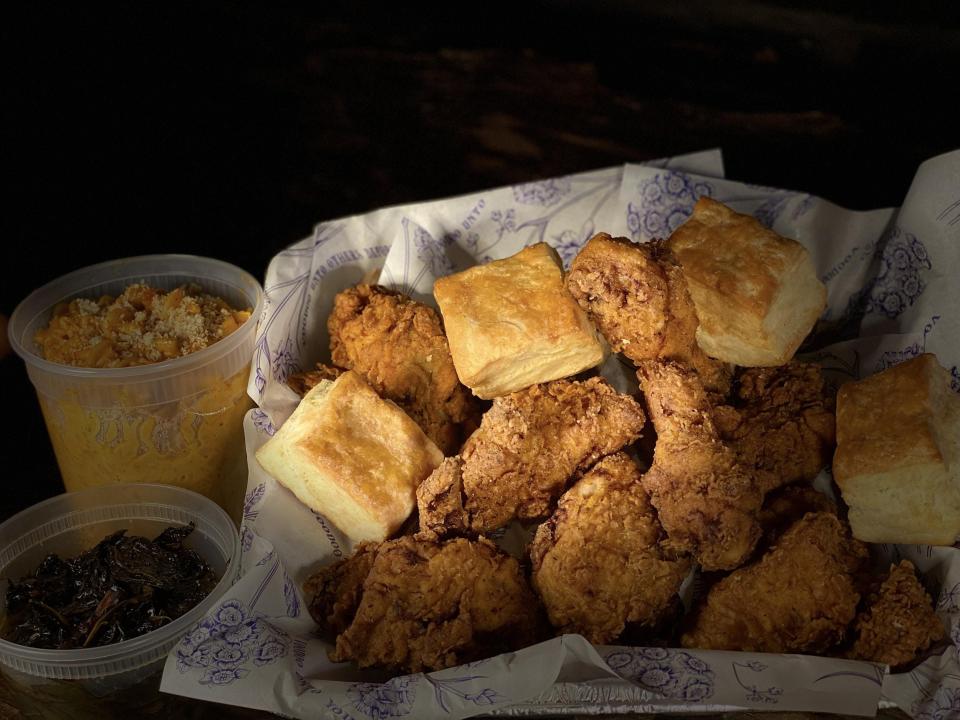 Popular combo at Voodoo Bayou in Palm Beach Gardens: Louisiana-style fried chicken and buttermilk biscuits.