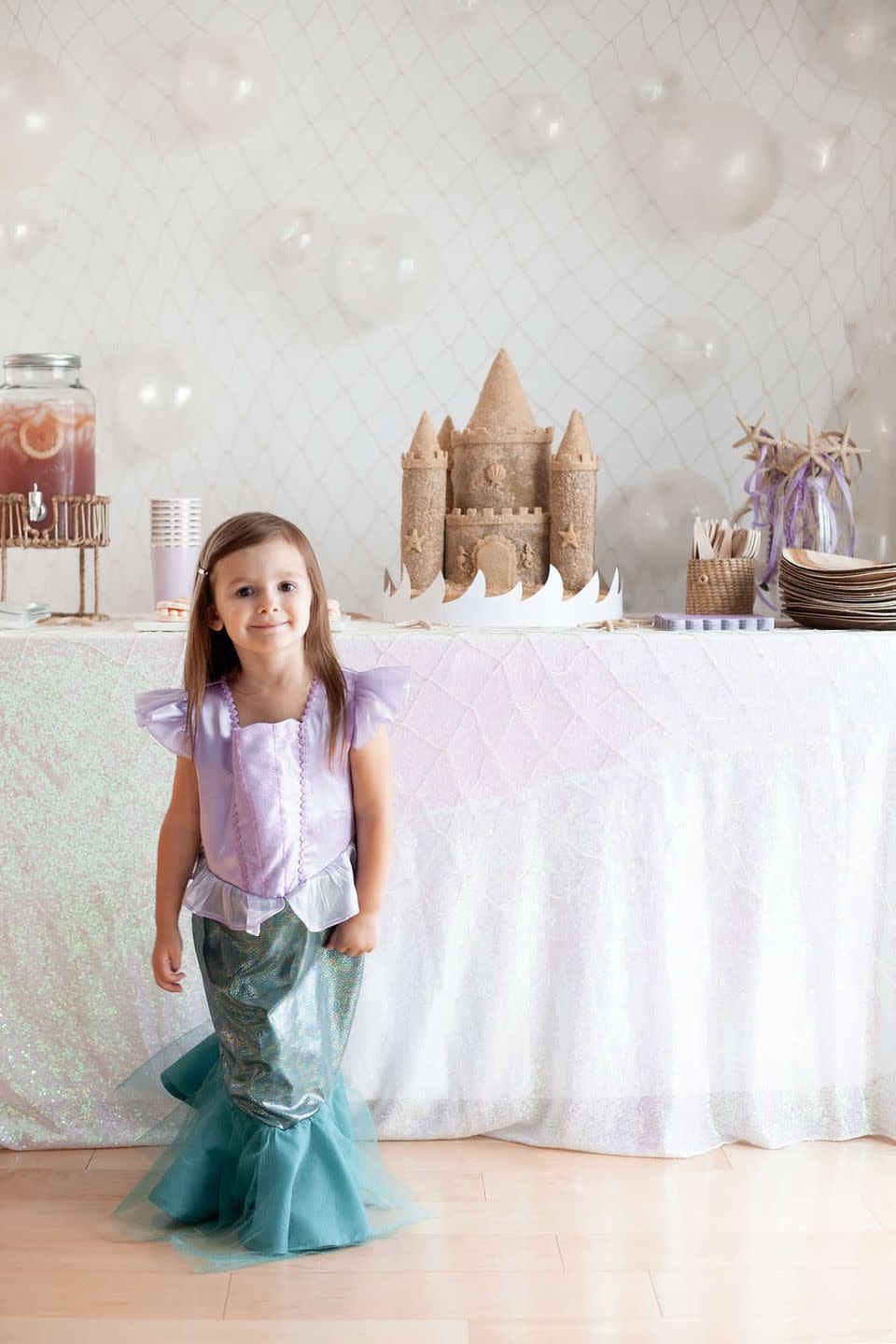 <p>Sandcastles, seashell-shaped plates, and netting used as table décor? Sounds like the makings of a picture-perfect mermaid-themed party to us—and one that will certainly appeal to littles!</p><p><strong>See more at <a href="https://abeautifulmess.com/mermaid-birthday-party/" rel="nofollow noopener" target="_blank" data-ylk="slk:A Beautiful Mess" class="link ">A Beautiful Mess</a>.</strong></p><p><strong><a class="link " href="https://go.redirectingat.com?id=74968X1596630&url=https%3A%2F%2Fwww.walmart.com%2Fsearch%3Fq%3Dmermaid%2Bplates%26typeahead%3Dmermaid%2Bplates&sref=https%3A%2F%2Fwww.thepioneerwoman.com%2Fhome-lifestyle%2Fentertaining%2Fg41021040%2Fbest-party-themes%2F" rel="nofollow noopener" target="_blank" data-ylk="slk:SHOP MERMAID PLATES">SHOP MERMAID PLATES</a><br></strong></p>