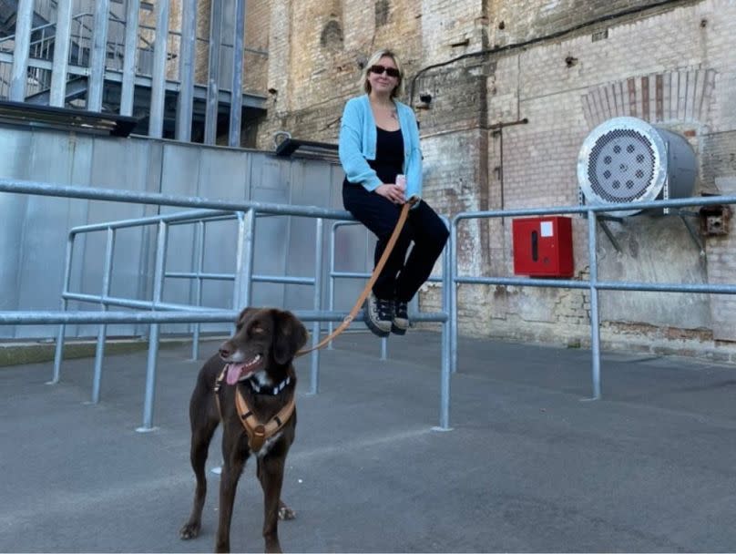 Maya with her adopted dog Bella. Bella was saved by Ukrainian armed forces after the liberation of Bucha.