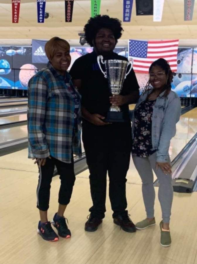 Dykashie “Kash” Harris with his mother, Tiffany Harris, and sister, Jasmine Byrd.