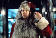 Dan Aykroyd, "Trading Places." After losing his job as part of a cruel bet between bosses Don Ameche and Ralph Bellamy (in which Eddie Murphy assumes his old life, with all its finery), Dan Aykroyd unravels and seeks his revenge at the company Christmas party, where he shows up in the nastiest ratty Santa costume ever, hoarding food and swilling booze, unable to execute his plan to frame Eddie Murphy for drug possession. Foiled, he slinks into the night and faces even more humiliation. Bleak despair has never been funnier, but that isn't, traditionally, the most Christmassy thing.
