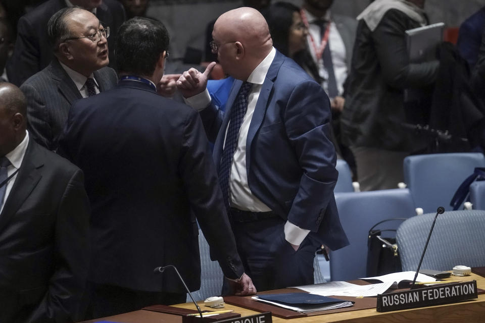 China's United Nations Ambassador Zhang Jun, left, confers with Russia's U.N. Ambassador Vasily Nebenzya, right, before a U.N. Security Council meeting over the conflict between Israel and the Palestinians, Wednesday, Oct. 25, 2023 at U.N. headquarters. (AP Photo/Bebeto Matthews)