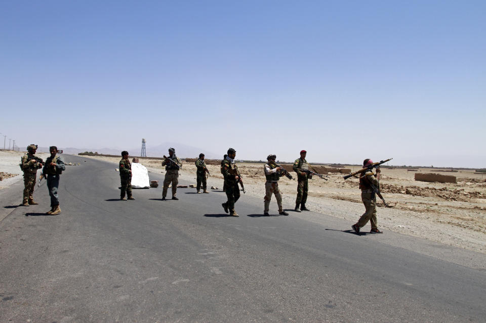 Afghan security personnel patrol after they took back control of parts of the city of Herat following fighting between Taliban and Afghan security forces on the outskirts of Herat, 640 km (397 miles) west of Kabul, Afghanistan, Sunday, Aug. 8, 2021. (AP Photo/Hamed Sarfarazi)