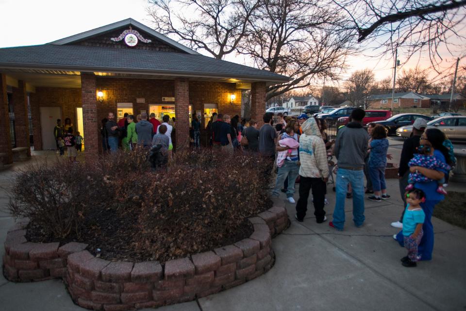 The line at the Ice Cream Shack on Northeast Adams Street continues to grow as the sun sets on opening day in 2015.