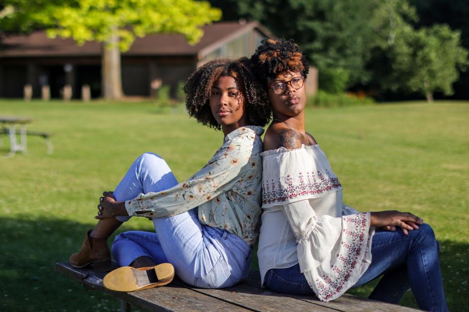 Macayla Jones, 24, Belleville, Mich. (right) and her sister Olivia Jones, 21, of Lansing, Mich. pose for a portrait at Island Area Recreation Area in Brighton, Mich. on Tuesday, June 11, 2024. The Jones’ sisters, living in swing state Michigan, understand how their peer's votes could tip the scales in 2024 and although they dislike both Republican and Democratic presidential candidates, their fear of Trump has to overpower their hatred for Biden.