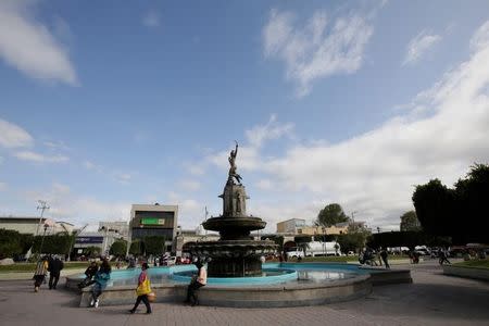 People are seen near the Diana Cazadora Monument in Zocalo Square in Ixmiquilpan, Mexico December 9, 2016. REUTERS/Henry Romero