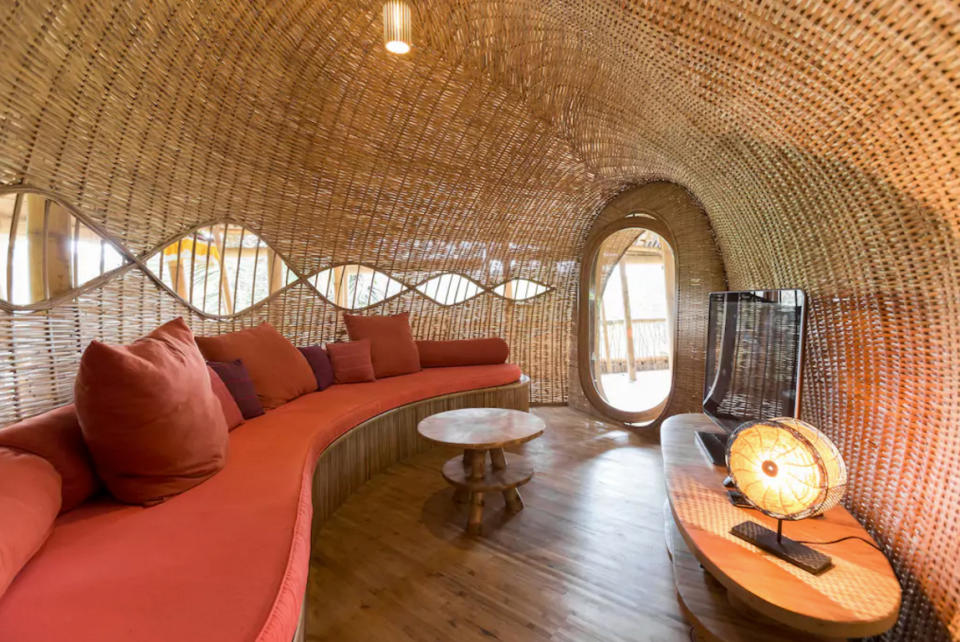 <p>There’s even an entertainment area enclosed in the open-concept main room. (Airbnb) </p>