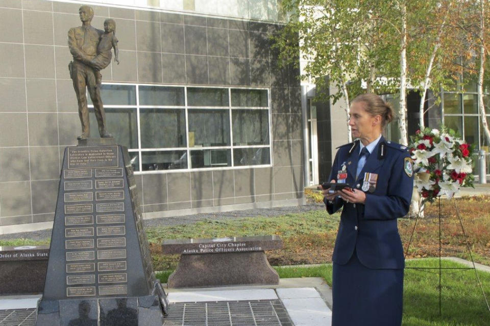 Shari Allison, chief inspector with the New South Wales Police Department, speaks at a police remembrance ceremony Friday, Sept. 27, 2019, in Anchorage, Alaska. Allison was among Australian delegates attending an international police convention who observed their region's fallen officers in the quickly planned ceremony with their Alaska counterparts. (AP Photo/Rachel D'Oro)