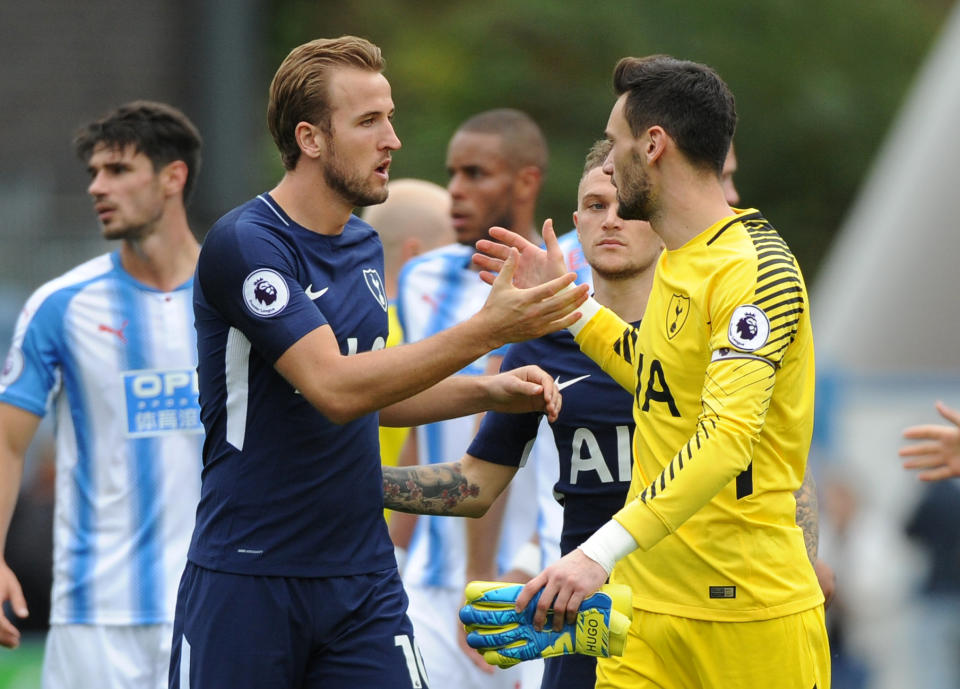 <p>Soccer Football – Premier League – Huddersfield Town vs Tottenham Hotspur – John Smith’s Stadium, Huddersfield, Britain – September 30, 2017 Tottenham’s Harry Kane and Hugo Lloris celebrate after the match REUTERS/Peter Powell EDITORIAL USE ONLY. No use with unauthorized audio, video, data, fixture lists, club/league logos or “live” services. Online in-match use limited to 75 images, no video emulation. No use in betting, games or single club/league/player publications. Please contact your account representative for further details. </p>