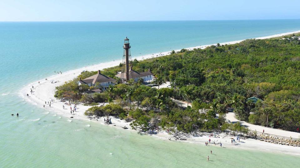 Aerial view of the lighthouse and clear waters off the coast of Sanibel Island, Florida