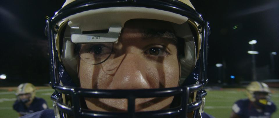 Gallaudet freshman quarterback Trevin Adams stars in AT&T's commercial for the 5G-connected helmet.