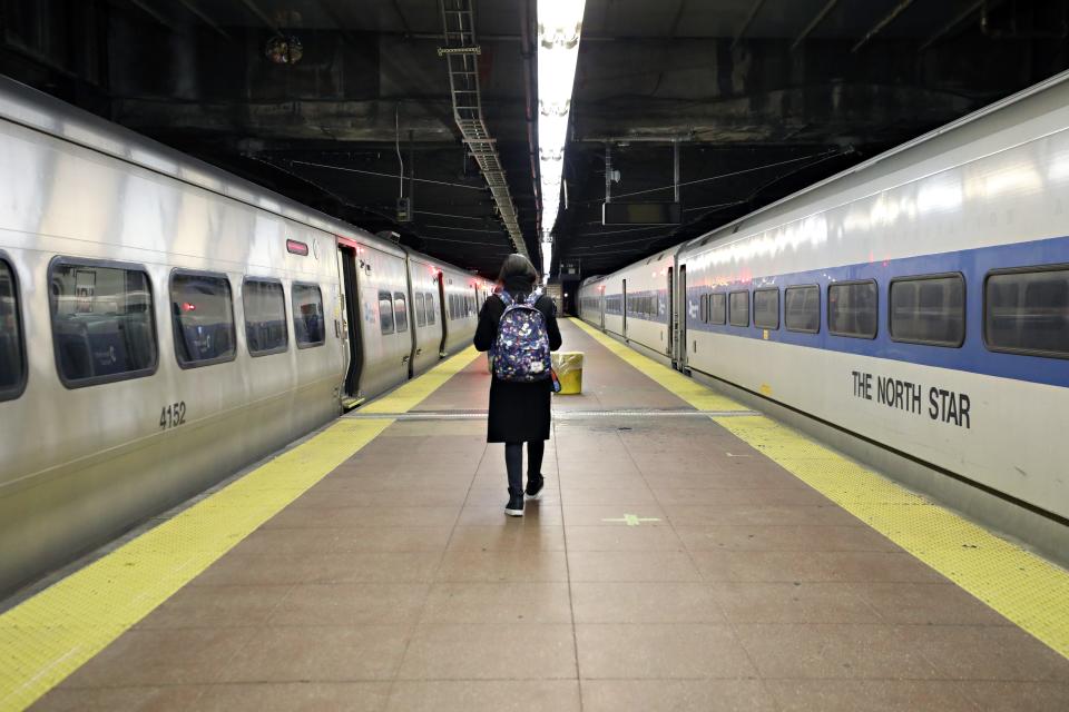 A commuter stands on an empty Metro North train platform at Grand Central Terminal  during rush hour on March 12, 2020 in New York City. As the coronavirus (COVID-19) continues to spread in the United States, many professional events have been canceled and some businesses are starting to have their employees work from home.