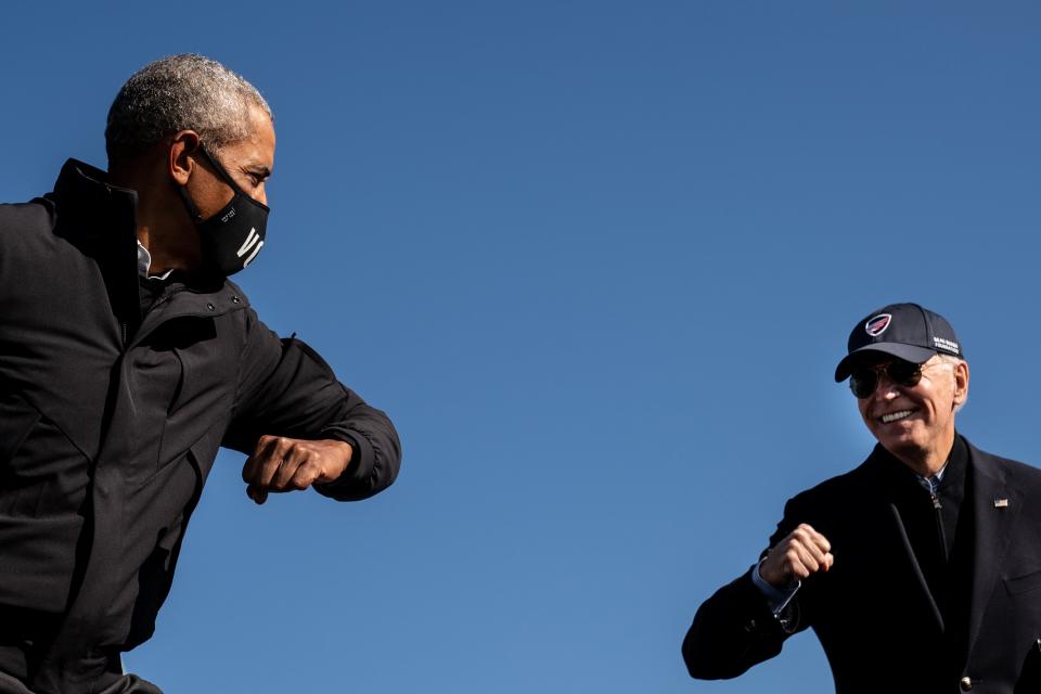 Barack Obama and Joe Biden greet each other at a rally in Flint, MichiganNew York Times / Redux / eyevine