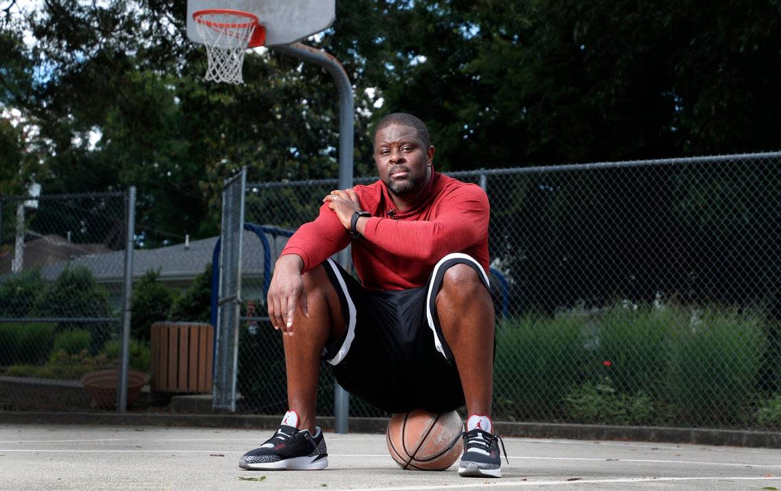 LeVelle Moton poses on the basketball court at LeVelle Moton Park in Raleigh, N.C., Wednesday, June 23, 2021.