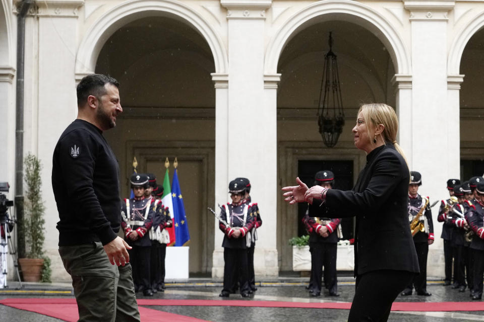 FILE - Italian Premier Giorgia Meloni, right, meets Ukrainian President Volodymyr Zelenskyy at Chigi Palace government's office in Rome, Saturday, May 13, 2023. When Giorgia Meloni took office a year ago as the first far-right premier in Italy's post-war history, concern was palpable abroad about the prospect of democratic backsliding and resistance to European Union rules. But since being sworn in as premier on Oct. 22, 2022, Meloni has confounded Western skeptics. (AP Photo/Alessandra Tarantino, File )