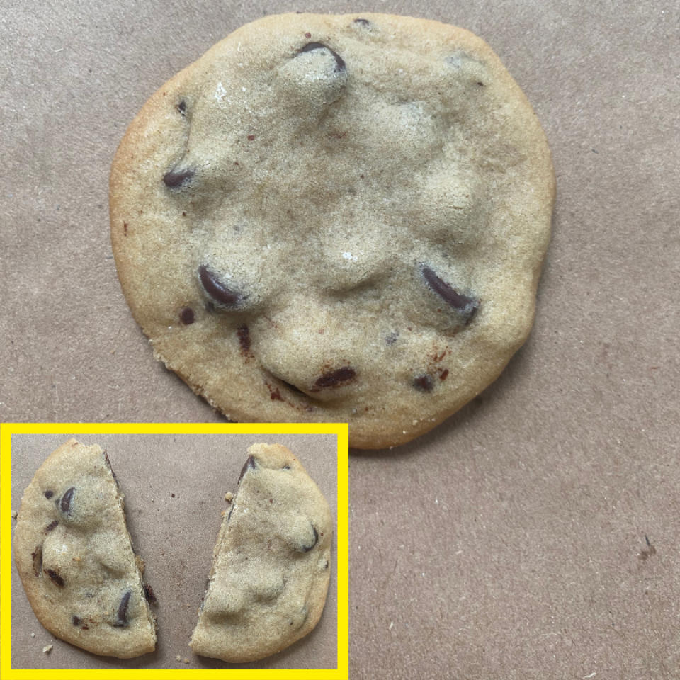 Chocolate chip cookie with a close-up inset image showing the cookie broken in half, revealing chocolate chunks inside