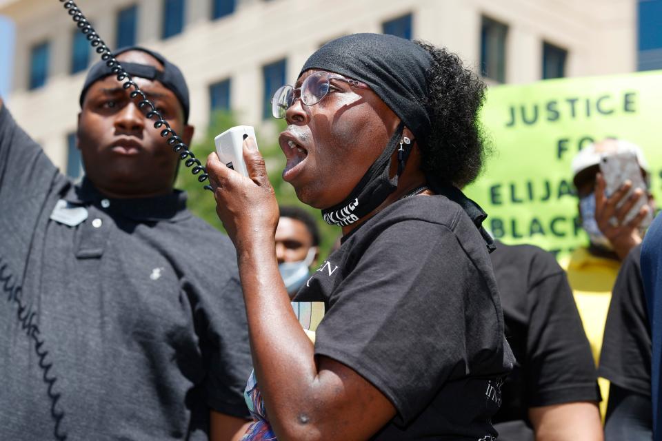 FILE - In this June 27, 2020, file photo, Sheneen McClain speaks during a rally and march over the death of her son, Elijah McClain, outside the police department in Aurora, Colo. The parents of Elijah McClain, a 23-year-old Black man who died after officers in suburban Denver stopped him on the street last year and put him in a chokehold, sued police and medical officials Tuesday, Aug. 11. (AP Photo/David Zalubowski, File) ORG XMIT: FX205