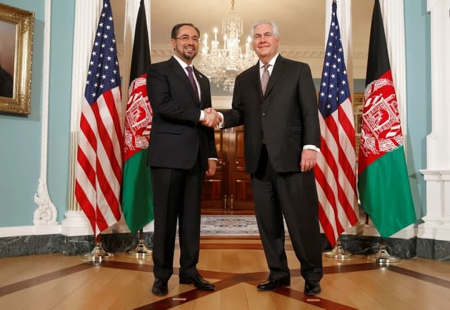 U.S. Secretary of State Rex Tillerson shakes hands with Afghan Foreign Minister Salahuddin Rabbani at the State Department. Joshua Roberts / Reuters