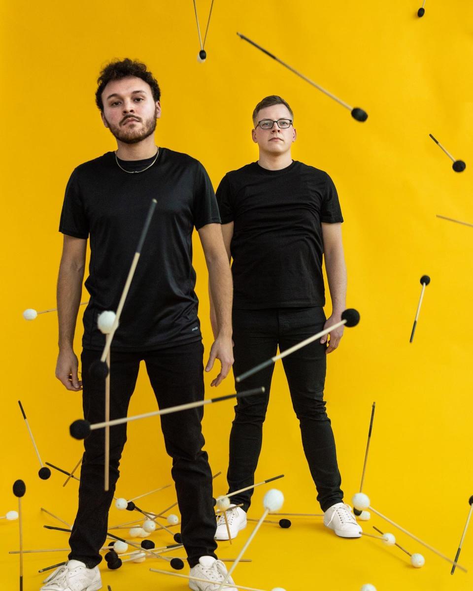 Based in Goshen and Madison, Wis., the percussion group pax duo — Tristan Swihart, left, and Micah Detweiler — performs April 8, 2023, at Ignition Music Garage in Goshen.