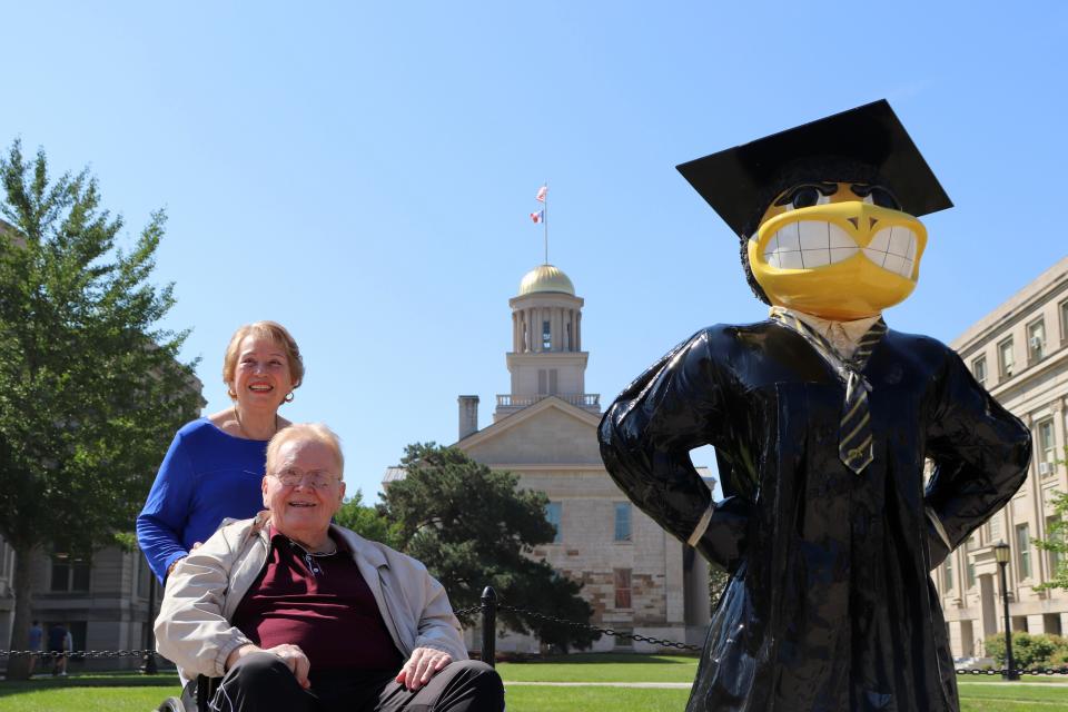 David and Margarita Wood pose for a photo on Friday, Aug. 18, 2023. Wood spent years as a paper boy in Iowa City as a child, wandering through the Pentacrest and taking refuge from cold winter temperatures in Macbride Hall, home of the UI's Museum of Natural History.