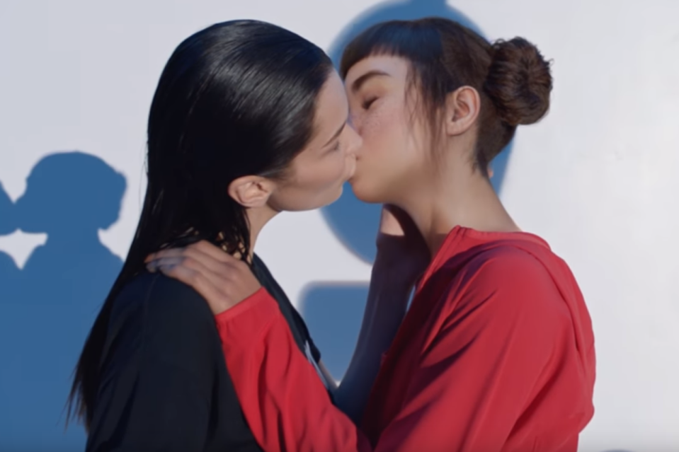 Calvin Klein apologises for 'queerbaiting' advert showing kiss between Bella Hadid and fictional woman Lil Miquela