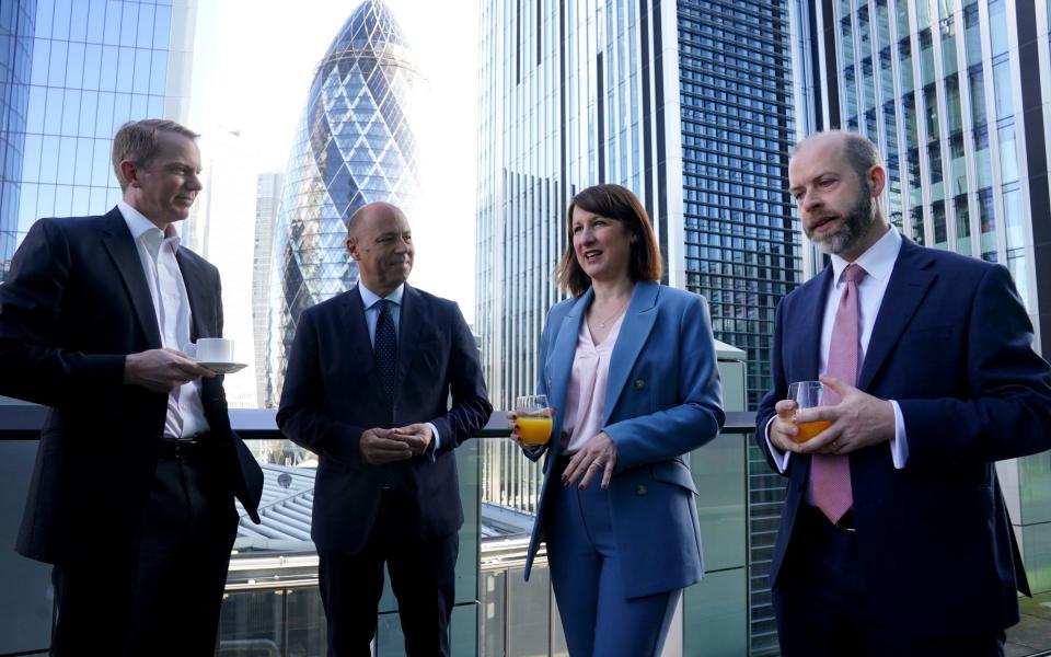 The shadow chancellor met with business leaders including Lloyds Banking Group boss Charlie Nunn, left, and Andrea Rossi, chief executive of investment group M&G, along with shadow business secretary Jonathan Reynolds, right