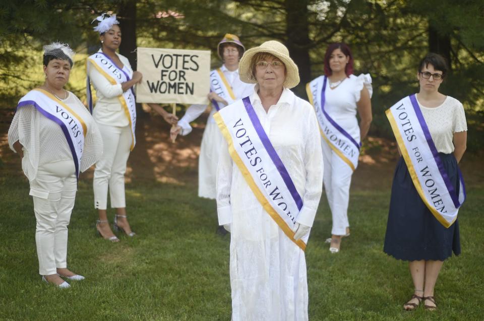 Candace Stitzman-Duley, center, a distant relative of Susan B. Anthony, poses with Democratic voting activists in Muhlenberg, Pa. <a href="https://media.gettyimages.com/photos/candace-stitzmanduley-front-back-from-left-are-ella-drumgold-of-of-picture-id1269372458" rel="nofollow noopener" target="_blank" data-ylk="slk:Ben Hasty/MediaNews Group/Reading Eagle via Getty Images;elm:context_link;itc:0;sec:content-canvas" class="link ">Ben Hasty/MediaNews Group/Reading Eagle via Getty Images</a>