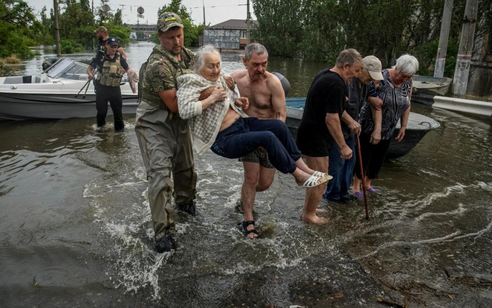 Shelling from the Russian bank has been hampering rescue operations in the area - REUTERS