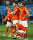 Netherland's players react during a penalty shootout in their 2014 World Cup semi-finals against Argentina at the Corinthians arena in Sao Paulo July 9, 2014. REUTERS/Darren Staples