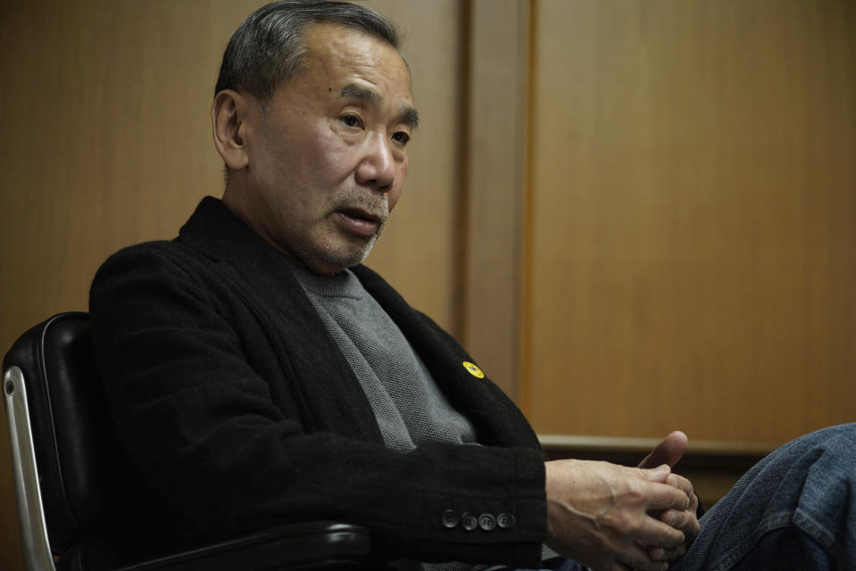 In this photo released by Shinchosha, Haruki Murakami speaks on March 17, 2023 at Shinchosha in Tokyo. Murakami wrote a story of a walled city when he was fresh off his debut. More than four decades later, as a seasoned and acclaimed novelist, he gave it a new life as "The City and Its Uncertain Walls." (Kenji Sugano/Shinchosha via AP)
