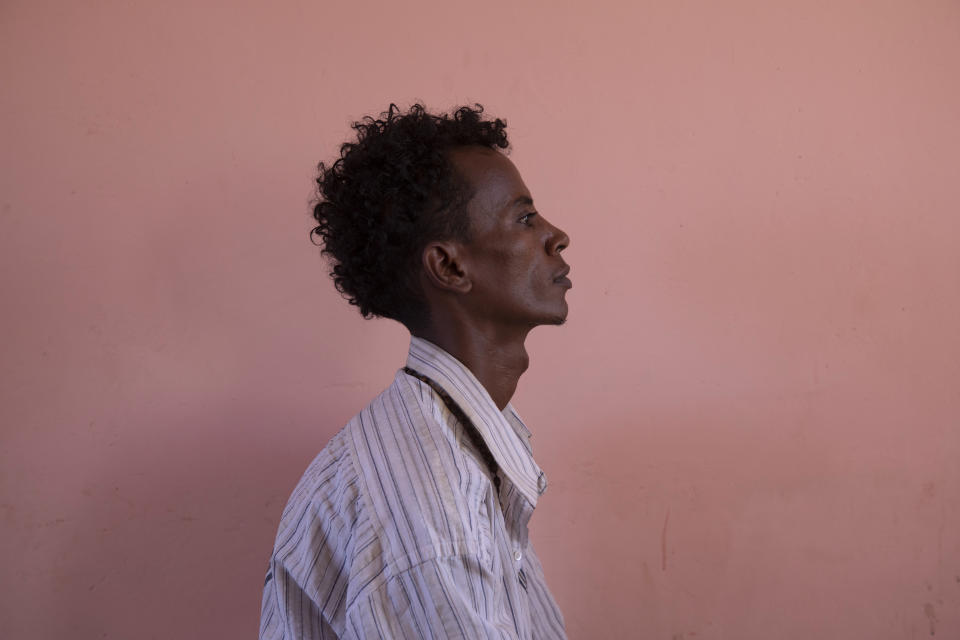 Tigrayan refugee Goitom Hagos, a 26-year-old nurse from Humera who fled the conflict in Ethiopia's Tigray, is photographed in eastern Sudan near the Sudan-Ethiopia border, on March 18, 2021. "I saw many Tigrayans collected and loaded into vehicles. I saw thousands," said Hagos, who was detained by police for several days with some 300 people, including children. (AP Photo/Nariman El-Mofty)