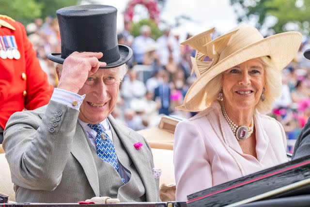 <p>Mark Cuthbert/UK Press via Getty</p> King Charles and Queen Camilla attend 2023 Royal Ascot