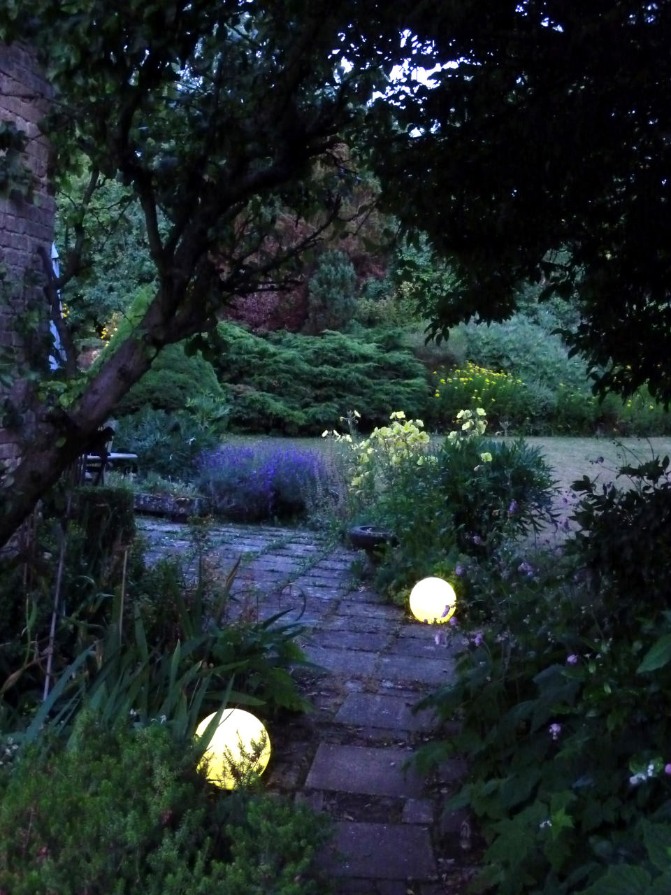 11. Combine lighting with garden path ideas