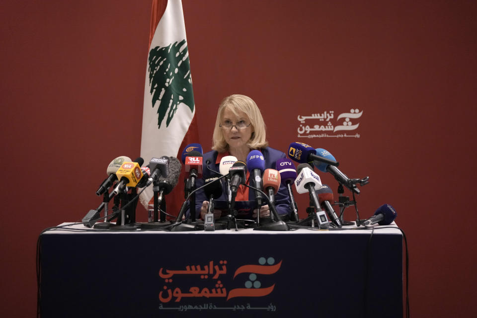 Tracy Chamoun, 61, the granddaughter of the late diplomat and Lebanese President Camille Chamoun, speaks during an announcement of her candidacy in the country's upcoming presidential election, in Beirut, Lebanon, Monday, Aug. 29, 2022. Chamoun announced her candidacy for the cash-strapped country's upcoming presidential elections on a platform critical of the Iran-backed Shiite group Hezbollah. (AP Photo/Hassan Ammar)