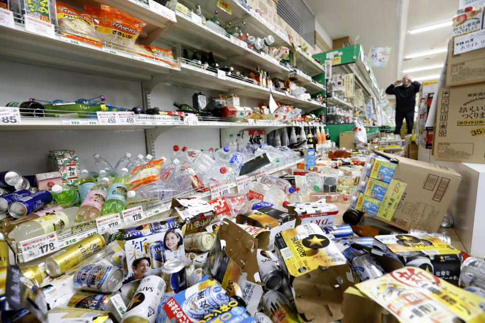 Cans and other items are scattered on the floor of a supermarket in Tsuruoka, Yamagata prefecture, northwestern Japan, Wednesday, June 19, 2019, after an earthquake. The powerful earthquake jolted northwestern Japan late Tuesday, prompting officials to issue a tsunami warning along the coast which was lifted about 2 ½ hours later. (Hironori Asakawa/Kyodo News via AP)