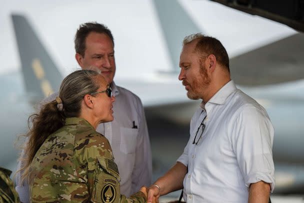PHOTO: Maj. Gen. Jami Shawley, the commanding general of Combined Joint Task Force-Horn of Africa, left, greets John T. Godfrey, the U.S. Ambassador to the Republic of Sudan, right, at Camp Lemonnier, Djibouti, April 23, 2023. (Staff. Sgt. Joseph Leveille via U.S. Air Force)