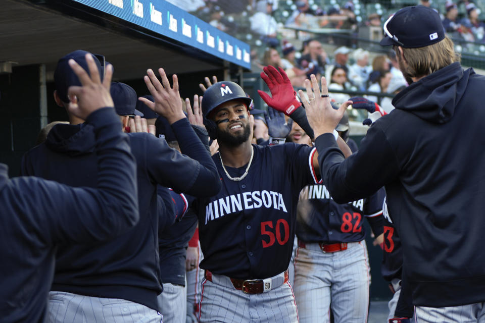 Minnesota Twins third base Willi Castro (50) celebrates his two-run home run against the Detroit Tigers in the sixth inning during the second baseball game of a doubleheader, Saturday, April 13, 2024, in Detroit. (AP Photo/Paul Sancya)