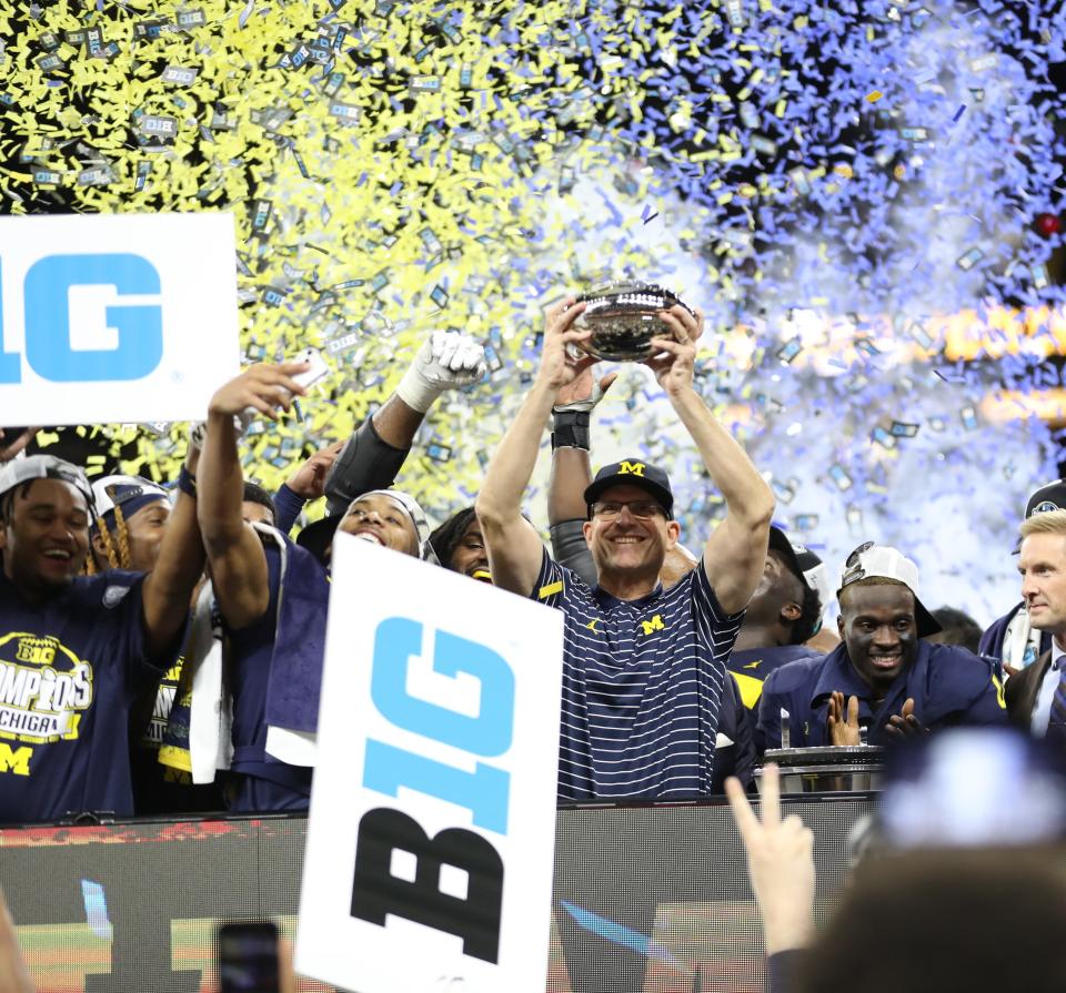 Michigan Wolverines head coach Jim Harbaugh celebrates the 43-22 win against the Purdue Boilermakers in the Big Ten championship game at Lucas Oil Stadium in Indianapolis on Saturday, Dec. 3, 2022.