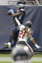 Tennessee Titans wide receiver A.J. Brown (11) catches a touchdown pass over Houston Texans cornerback Bradley Roby (21) in the second half of an NFL football game Sunday, Oct. 18, 2020, in Nashville, Tenn. (AP Photo/Mark Zaleski)