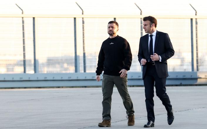 French President Emmanuel Macron walks next to Ukraine's President Volodymyr Zelensky - Mohammed Badra/POOL/EPA-EFE/Shutterstock