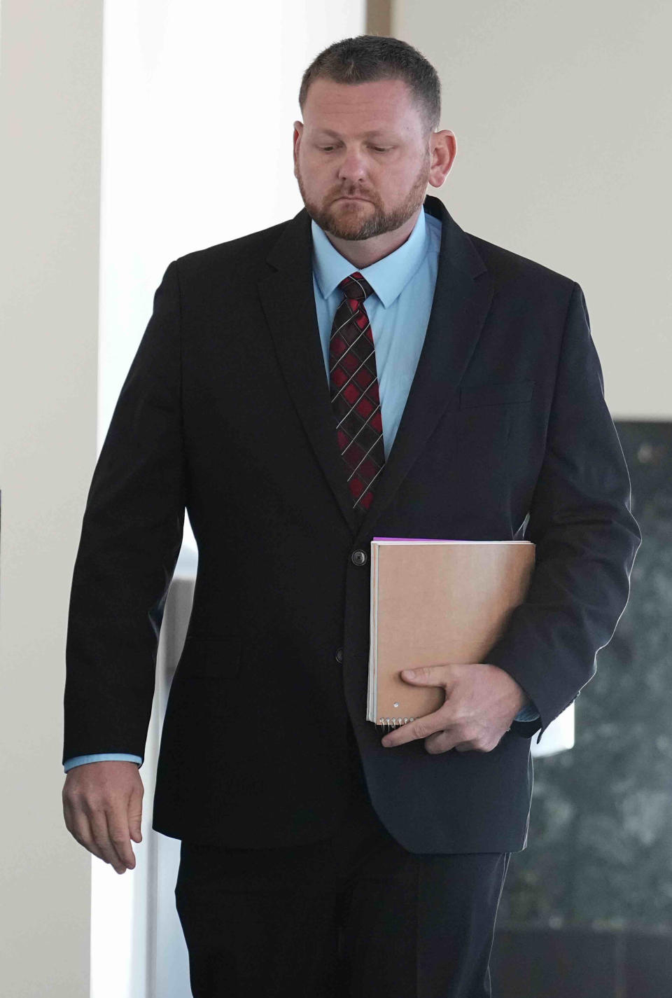 Defendant Randy Roedema walks into the Adams County Justice Center for the start of a trial of two of the police officers charged in the death of Elijah McClain, Wednesday, Sept. 20, 2023, in Brighton Colo. (AP Photo/Jack Dempsey)