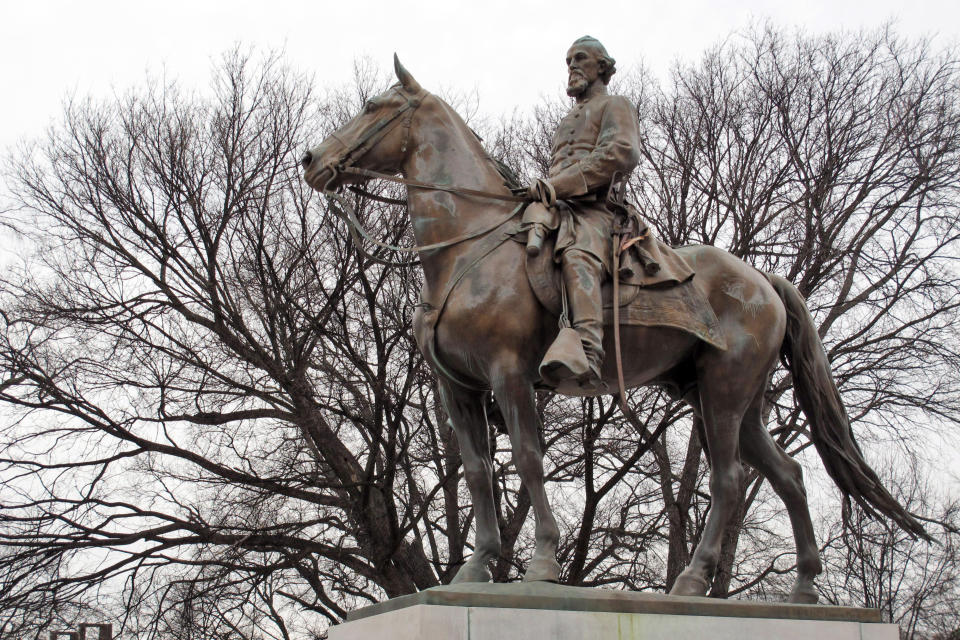 FILE - In this Feb. 6, 2013, file photo, a statue of Nathan Bedford Forrest rests on a concrete pedestal at a park named after the confederate cavalryman in Memphis Tenn. Workers arrived at a Tennessee park Tuesday, June 1, 2021, to begin the process of digging up the remains of Confederate Gen. Nathan Bedford Forrest, and moving the former slave trader’s body from its longtime resting place in Memphis to a museum hundreds of miles away. (AP Photo/Adrian Sainz, File)