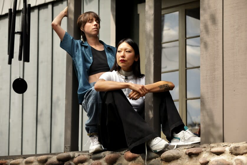 LOS ANGELES-CA-OCTOBER 18, 2021: L.A. musicians Hand Habits (Meg Duffy), left, and Sasami, right, are photographed at home in Los Angeles on Monday, October 18, 2021. (Christina House / Los Angeles Times)