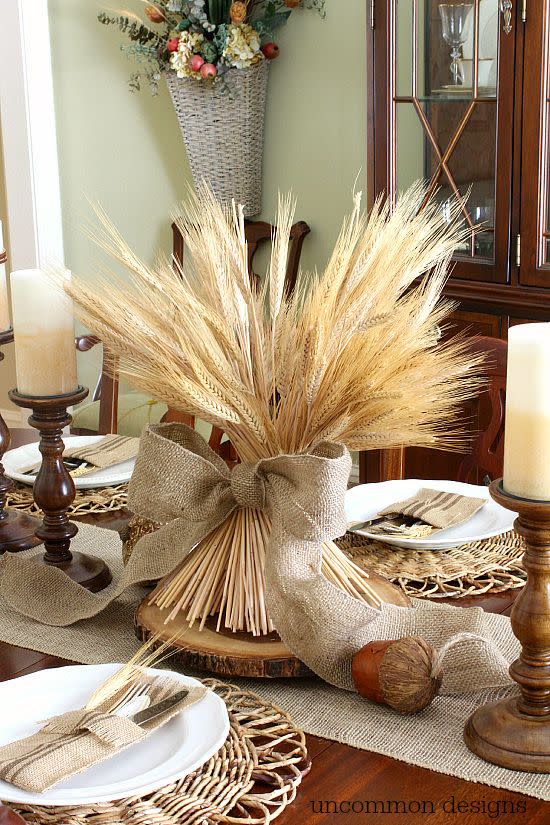 <p>Wheat bundles, wood slices, rustic burlap, and woven chargers make this neutral tablescape warm and inviting. </p><p><em><strong><a href="https://uncommondesignsonline.com/a-neutral-thanksgiving-tablescape/" rel="nofollow noopener" target="_blank" data-ylk="slk:Get the tutorial at Uncommon Designs;elm:context_link;itc:0;sec:content-canvas" class="link ">Get the tutorial at Uncommon Designs</a>. </strong></em></p><p><a class="link " href="https://www.amazon.com/IcosaMro-Placemats-Natural-Tablemat-Christmas/dp/B08QMKDDXC?tag=syn-yahoo-20&ascsubtag=%5Bartid%7C10070.g.23289609%5Bsrc%7Cyahoo-us" rel="nofollow noopener" target="_blank" data-ylk="slk:SHOP WOVEN CHARGERS;elm:context_link;itc:0;sec:content-canvas">SHOP WOVEN CHARGERS</a></p>