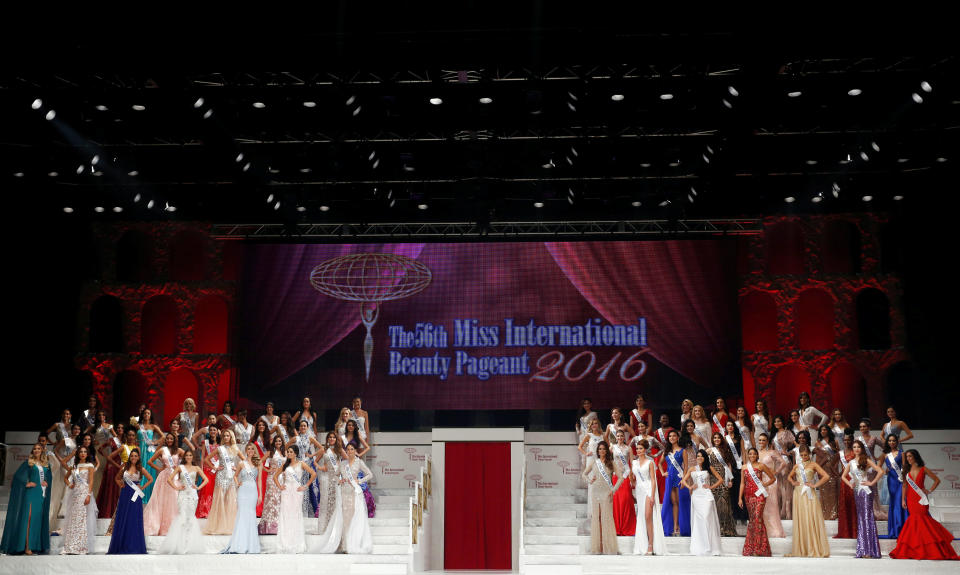 Contestants wearing evening dresses pose during the 56th Miss International Beauty Pageant in Tokyo, Japan October 27, 2016. REUTERS/Kim Kyung-Hoon