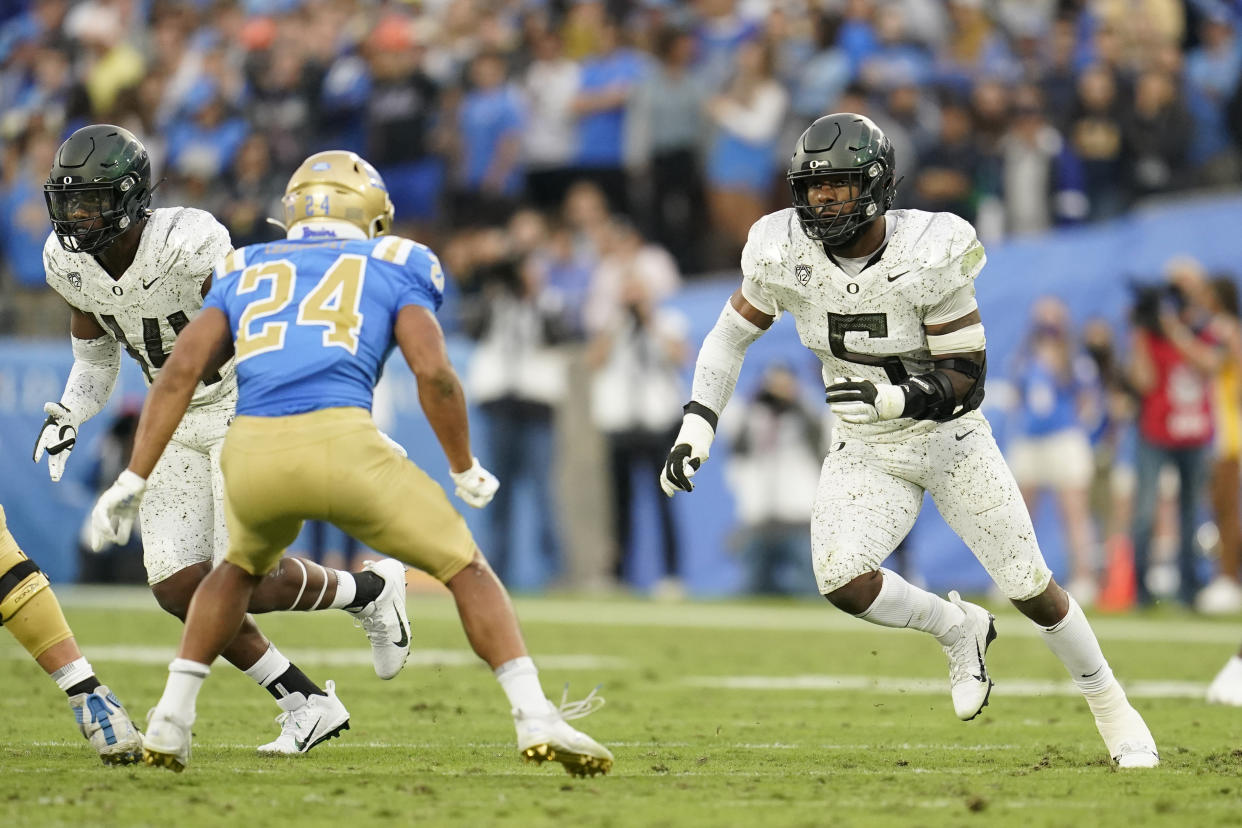Oregon defensive end Kayvon Thibodeaux (5) defends against UCLA during the second half of an NCAA college football game Saturday, Oct. 23, 2021, in Pasadena, Calif. (AP Photo/Marcio Jose Sanchez)
