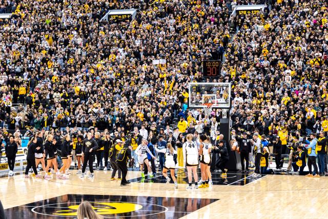 The Coolest Scenes From Iowa Women's Basketball Game at School's Football  Stadium