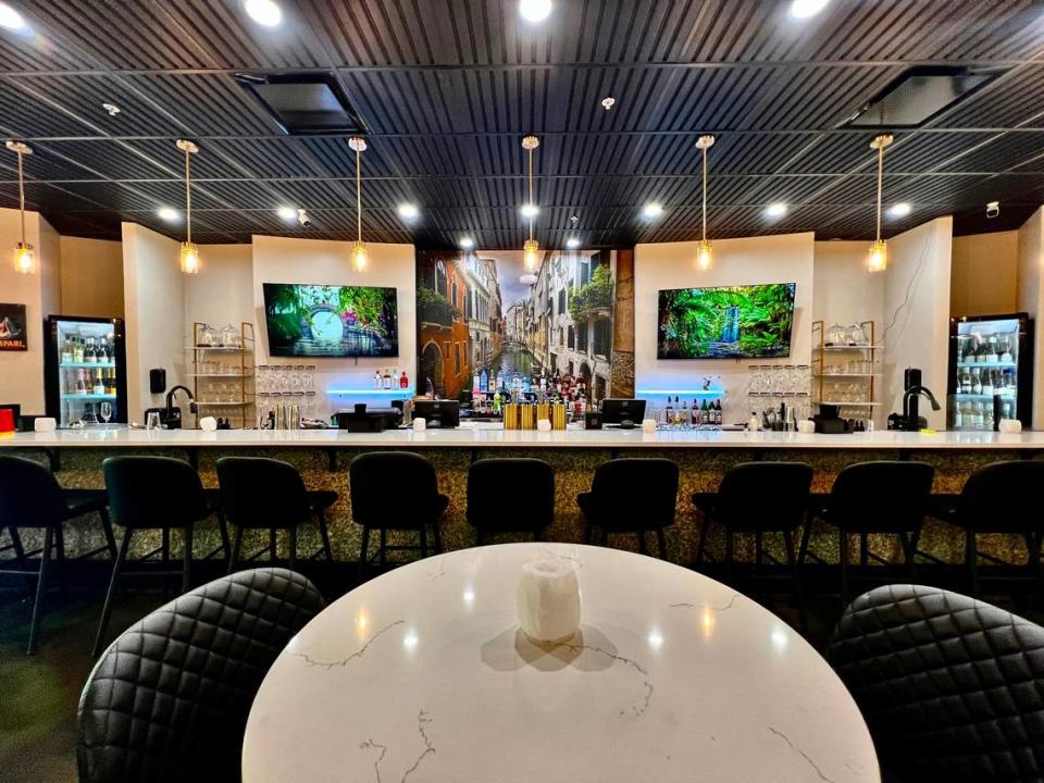 The full-service bar and social area at Acqua Ragazza in Mooresville serves high-end cocktails and bourbon, as well as an extensive wine list, many from Italy.