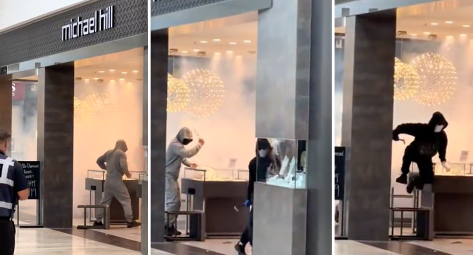 Thieves can be seen smashing Michael Hill jewellery cabinets at a store in New Zealand.